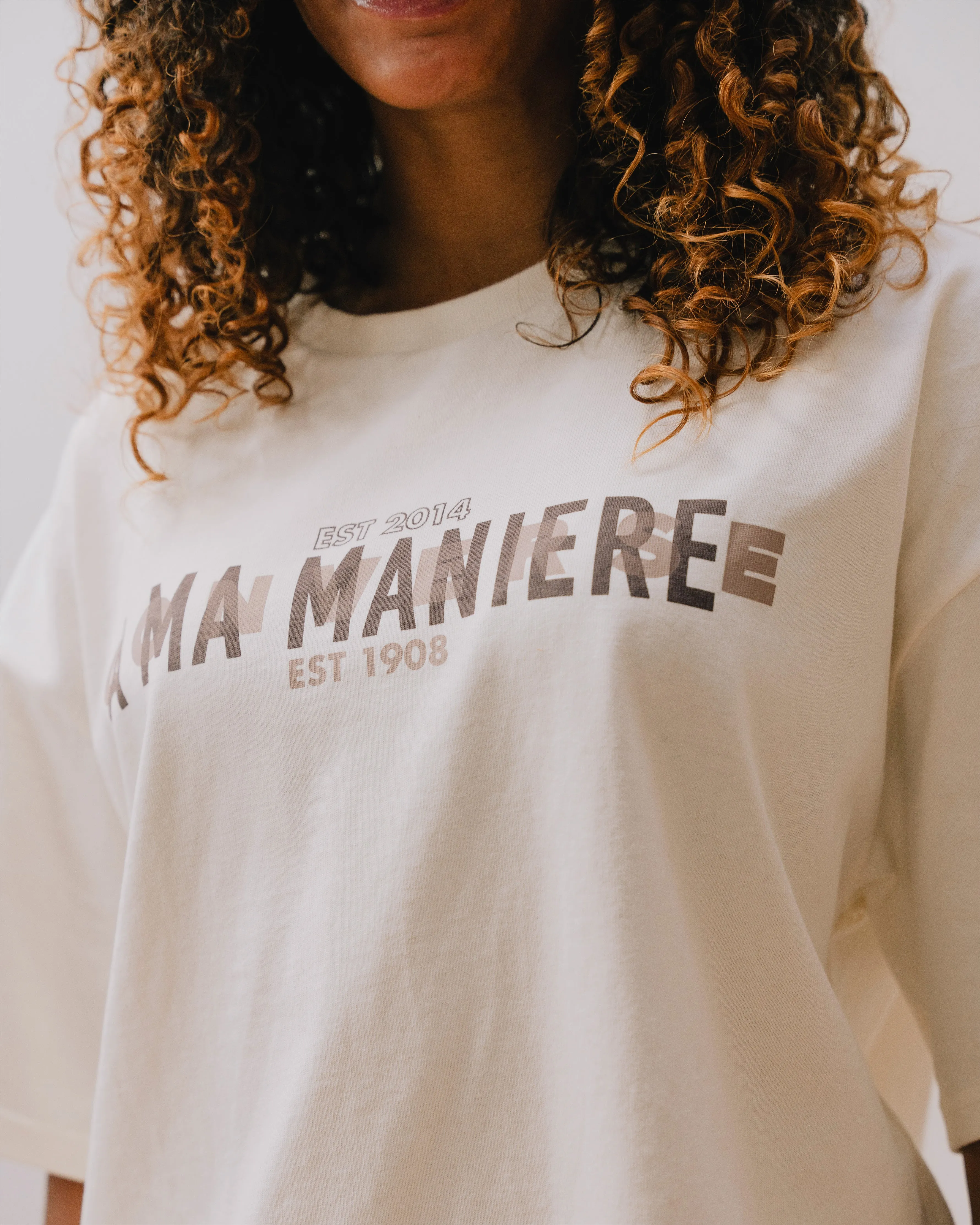 Flowy Feature Amm Tee