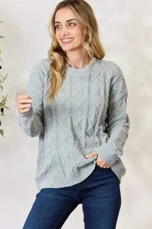 Pull col rond à motif torsadé