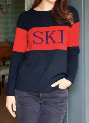 Pull de ski à motifs colorés en marine/rouge
