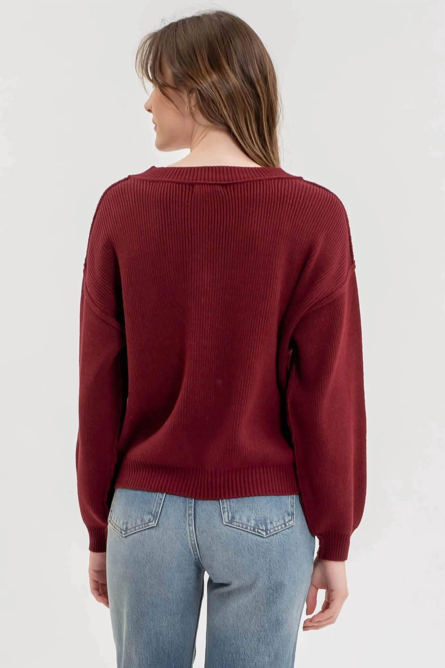 Pull col V à coutures apparentes en rouge