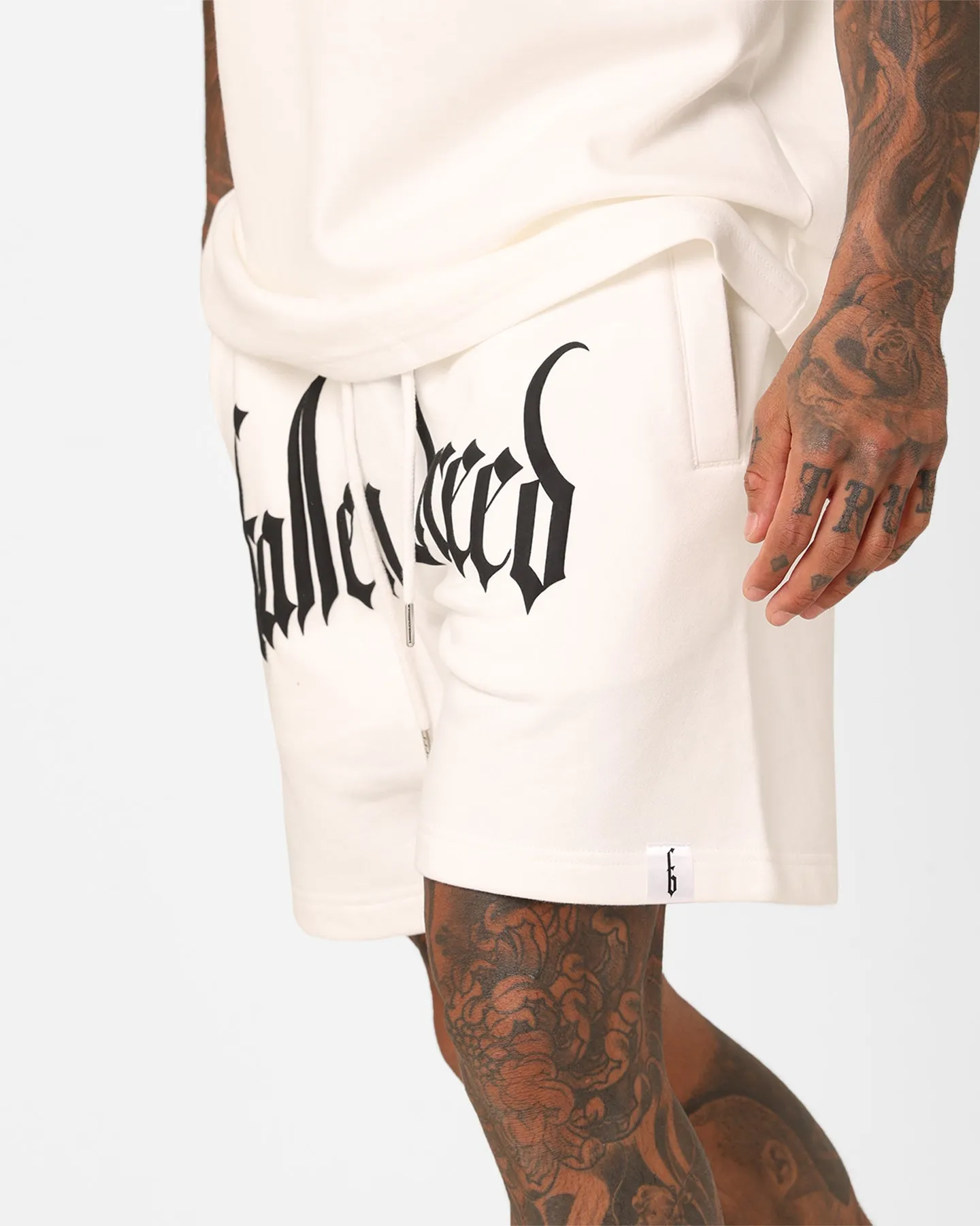 Short de survêtement à zip avec logo puff Fallen Breed Blanc/Noir