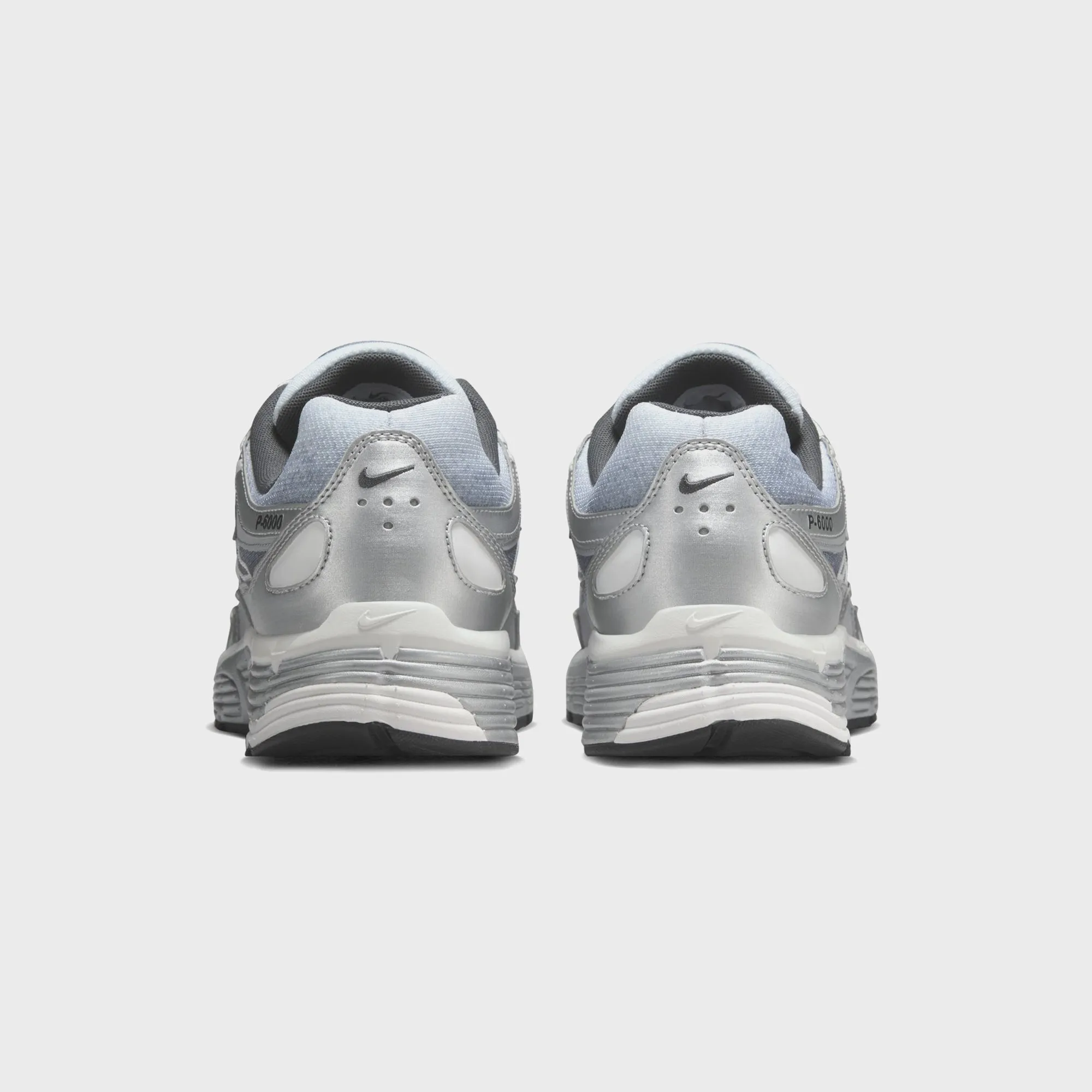 Confidence Starts Here Step into the Beat Nike P-6000 - Metallic Silver / Summit White / Wolf Grey