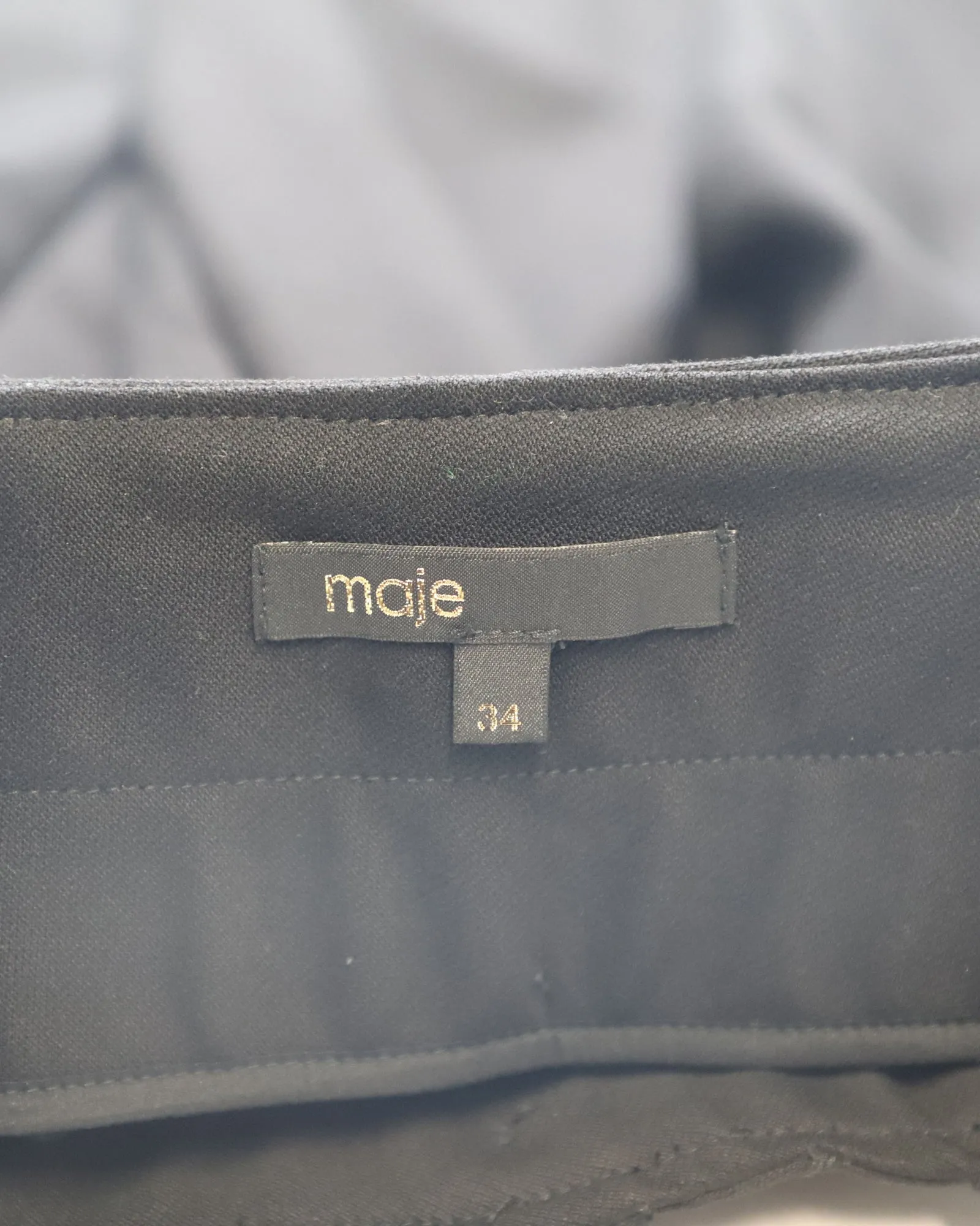 Jupe plissée à boutons apparents Maje en coton noir