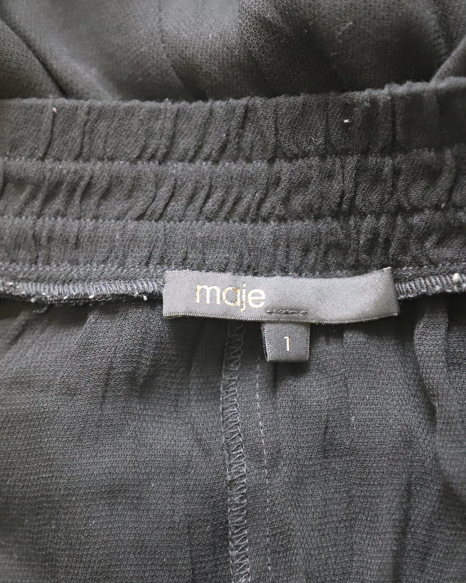 Jupe mi-longue en crêpe enveloppante Maje Jonala en viscose noire