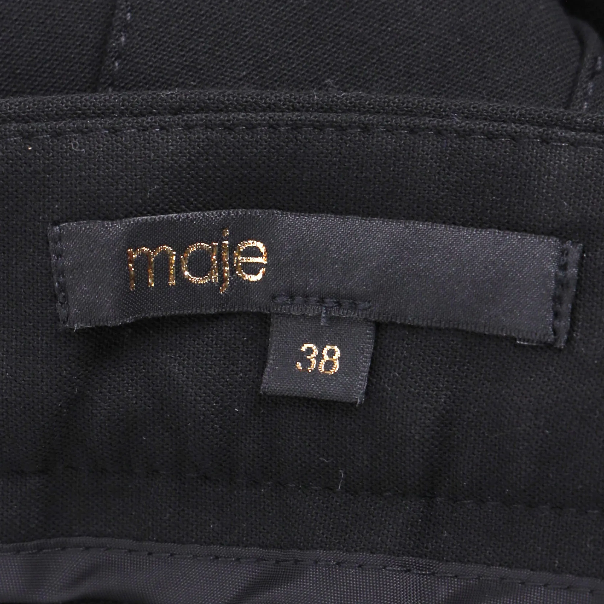 Jupe plissée mini asymétrique Maje en laine noire