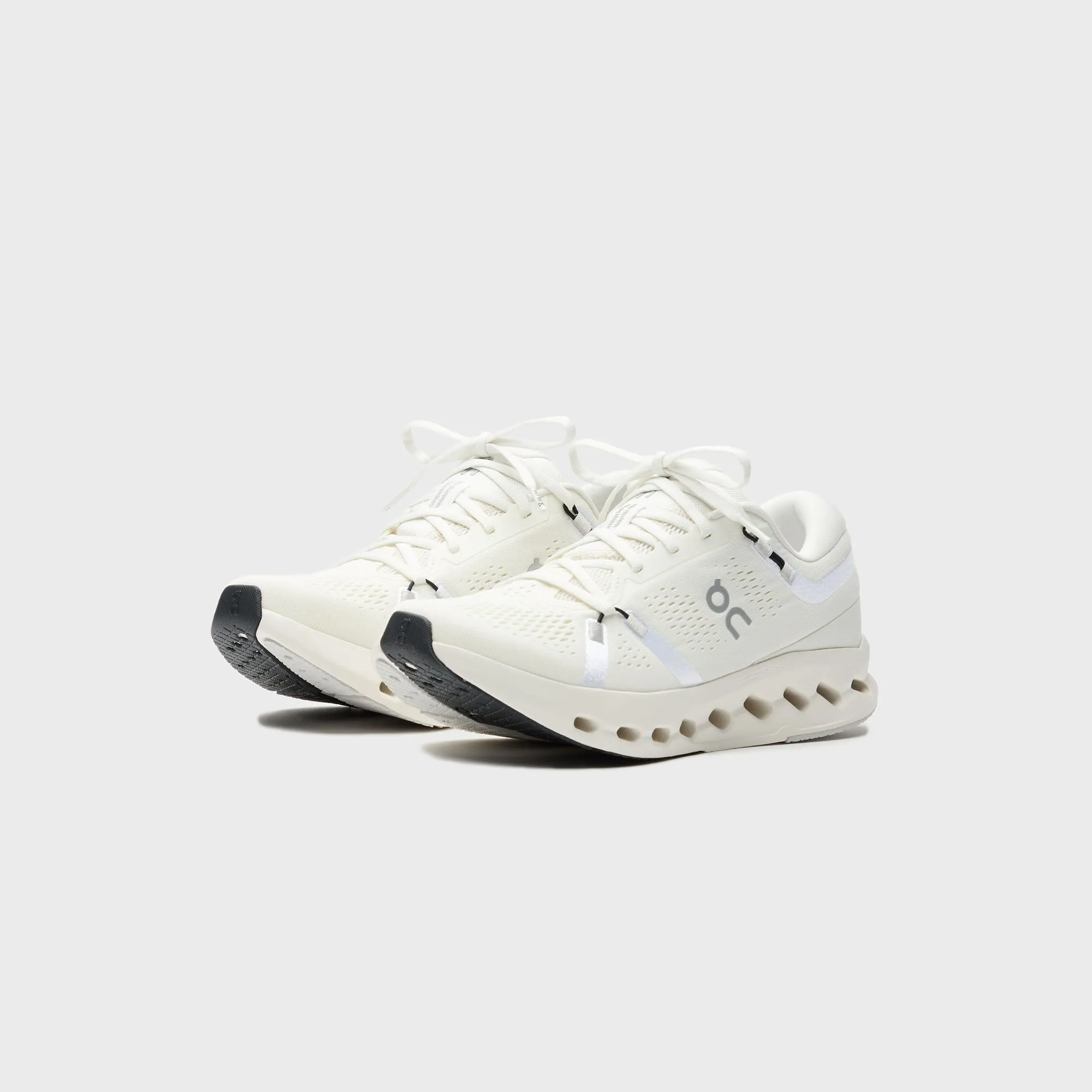 Comfortable Deceleration Traction Improvement System On Running Cloudsurfer 2 - Ivory