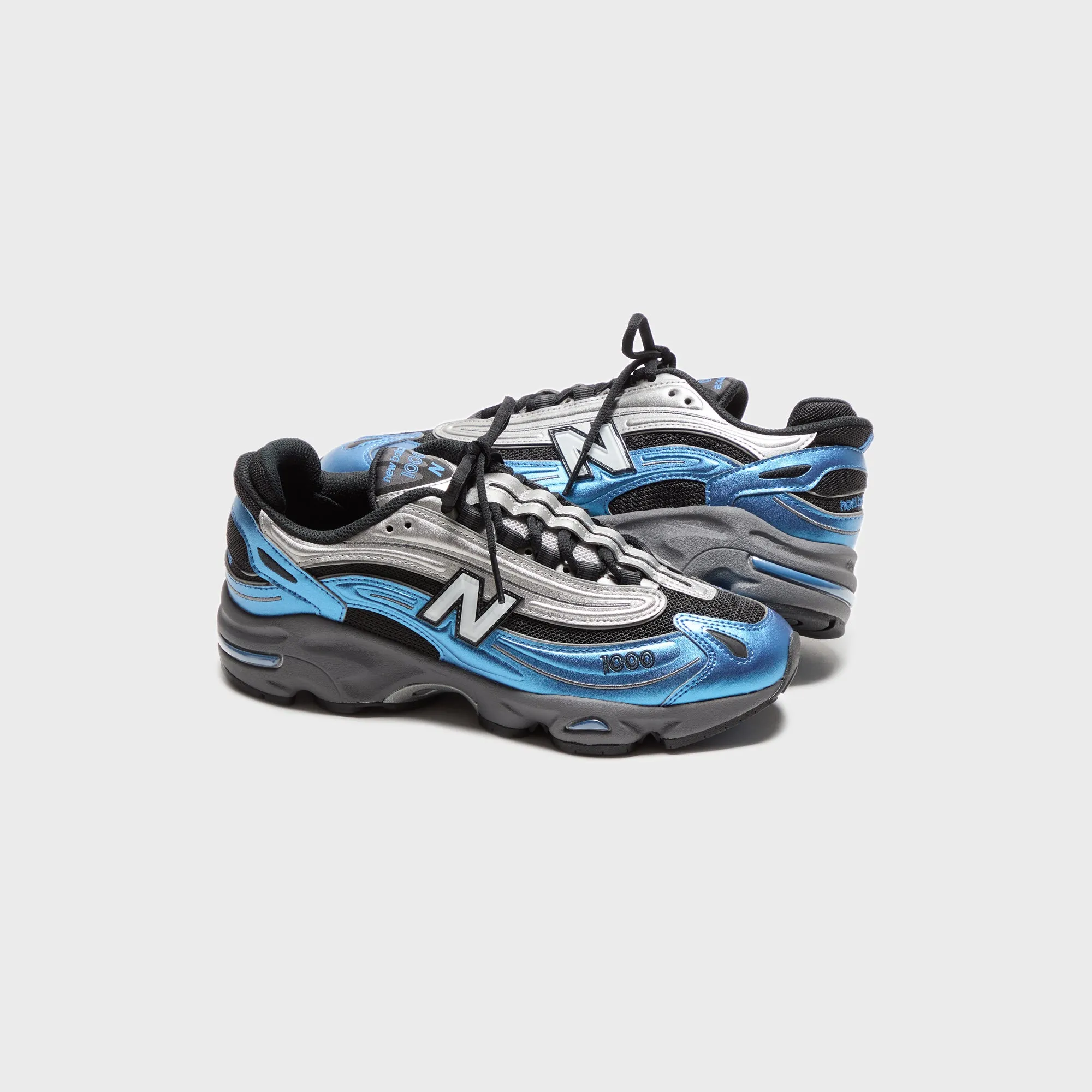 Strong And Durable Leather Nirvana Tribalistically New Balance M1000 - Metallic Blue