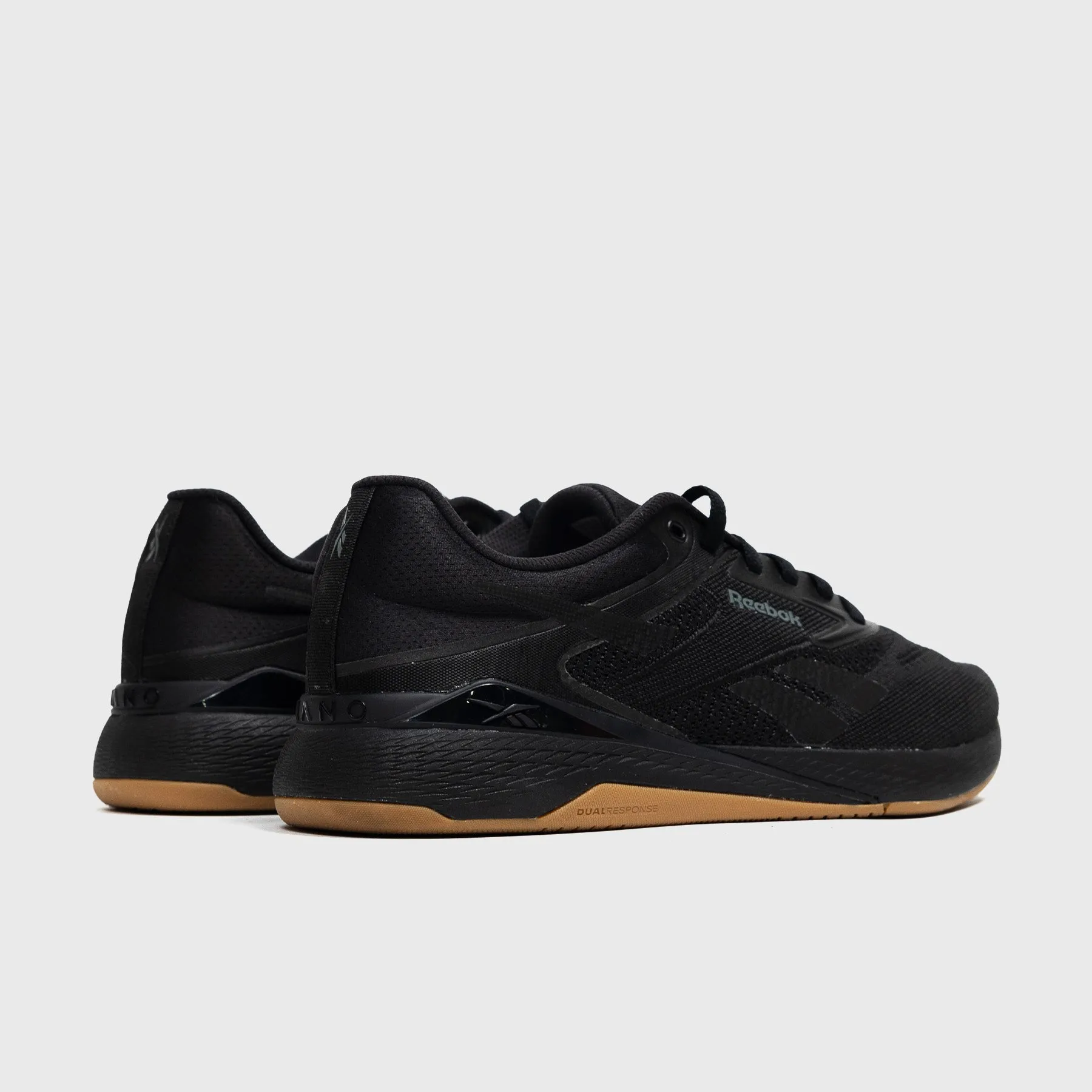 Comfort Repose Reebok - Nano X5 - Black/Grey/Gum