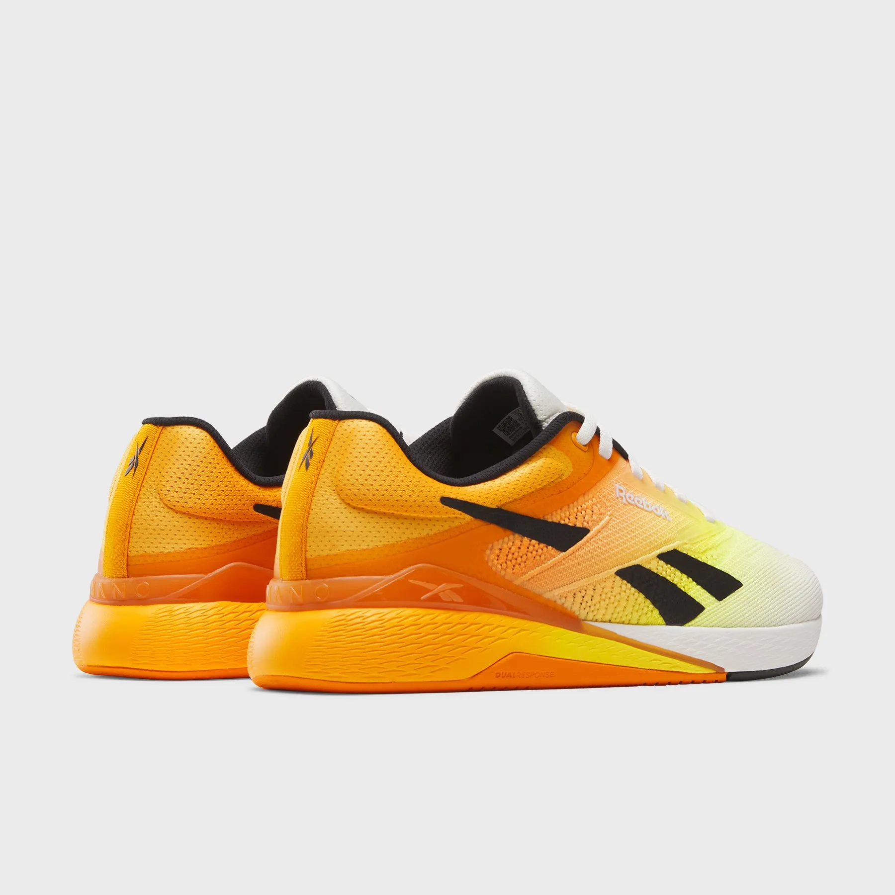 ReinforcedEdge Reebok - Nano X5 - Chalk/Black/Electric Amber