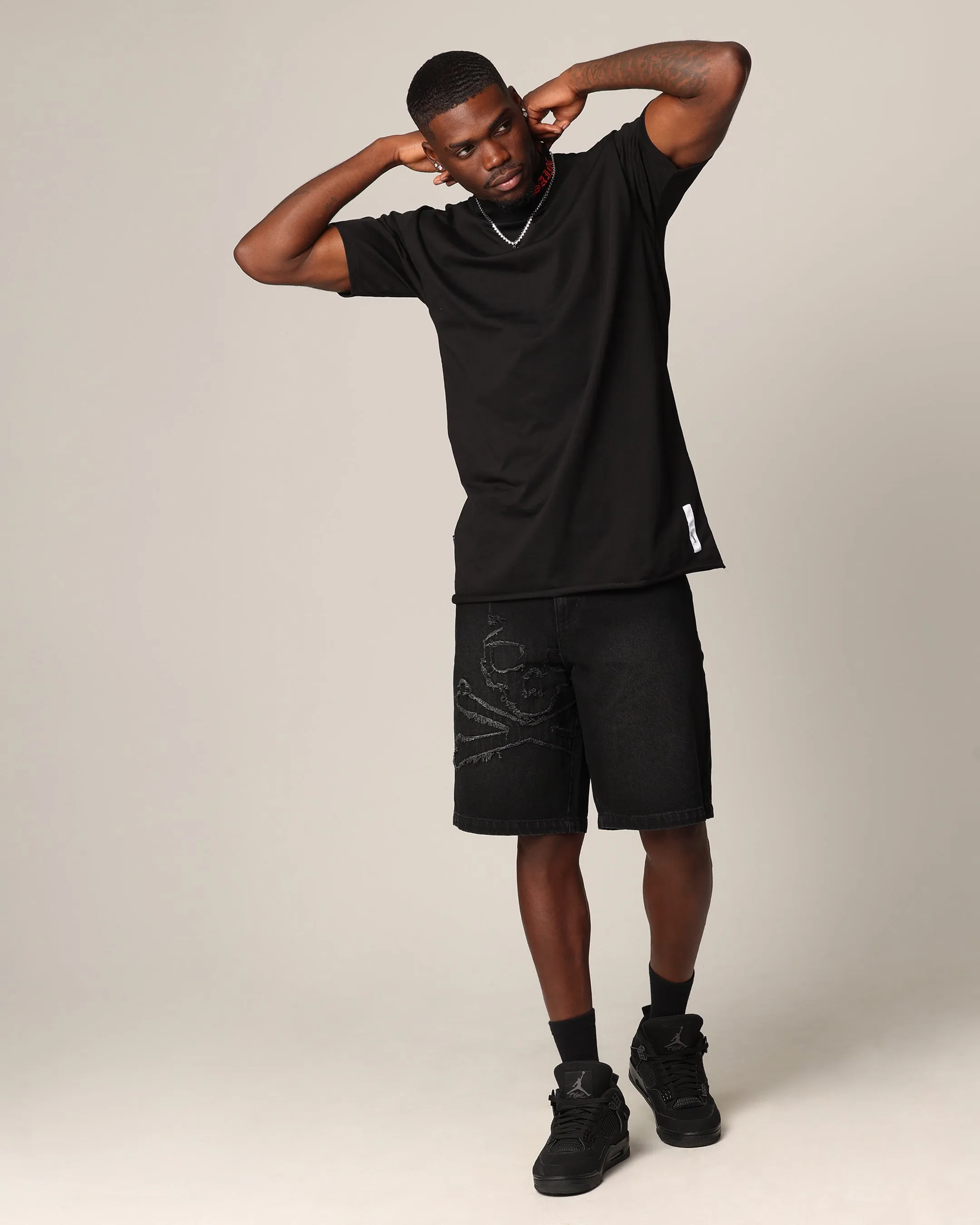 Saint Morta Shorts en Jean à Motif Demi-Crâne Lavé Noir