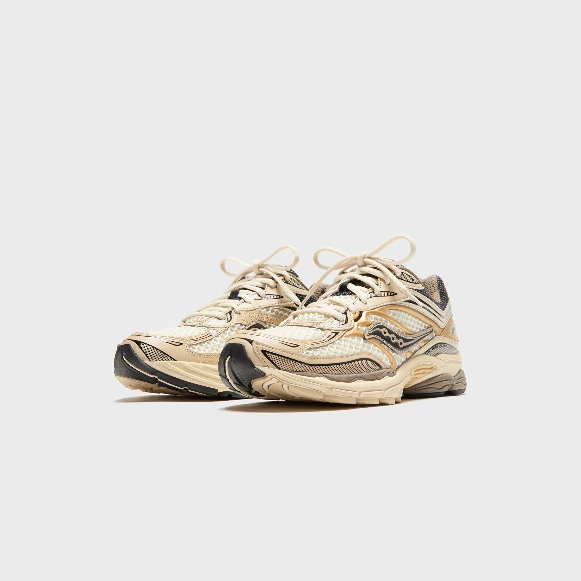 Saucony Progrid Omni 9 - Gold Step Into Strength Rule the Streets