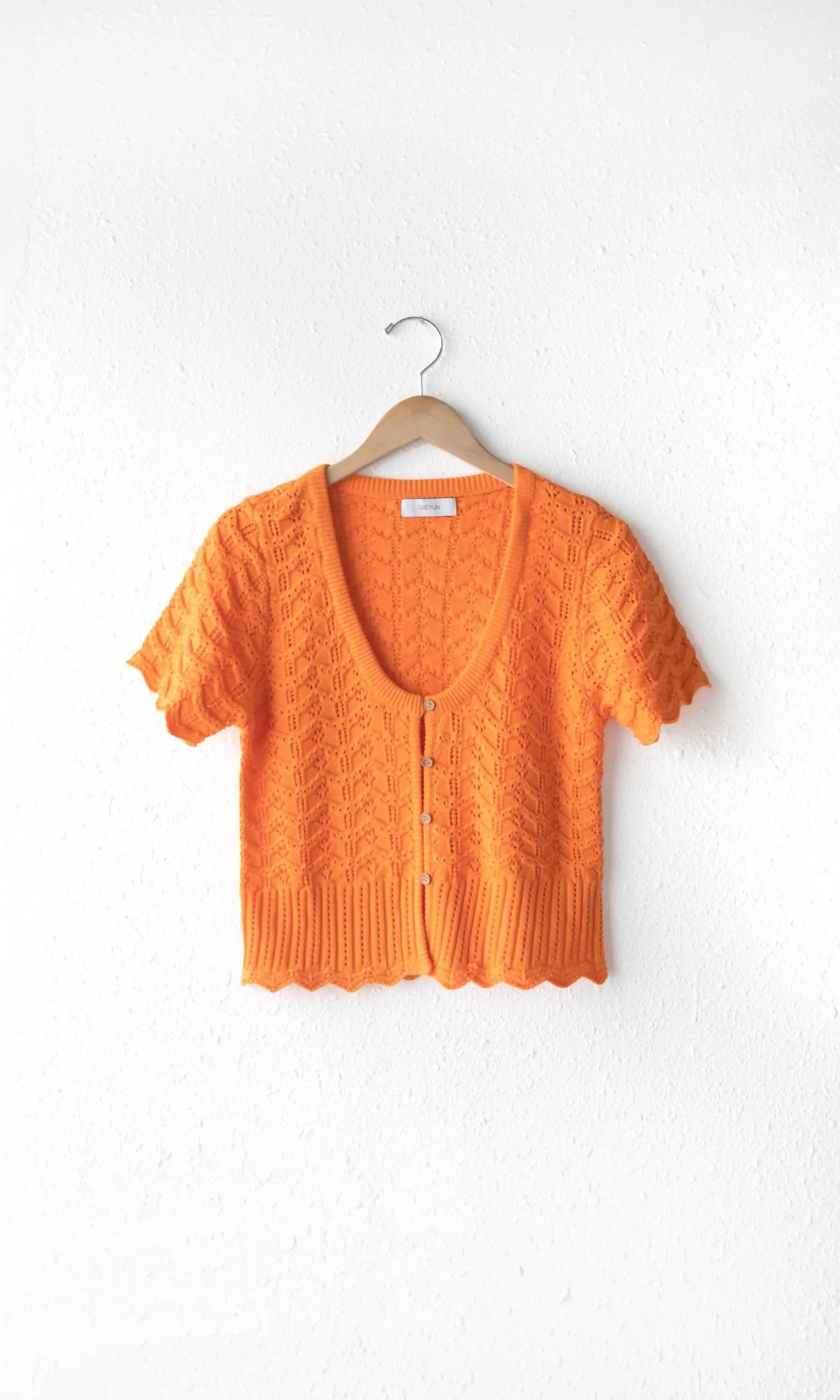 Cardigan Shanti à encolure échancrée et motifs festonnés en orange