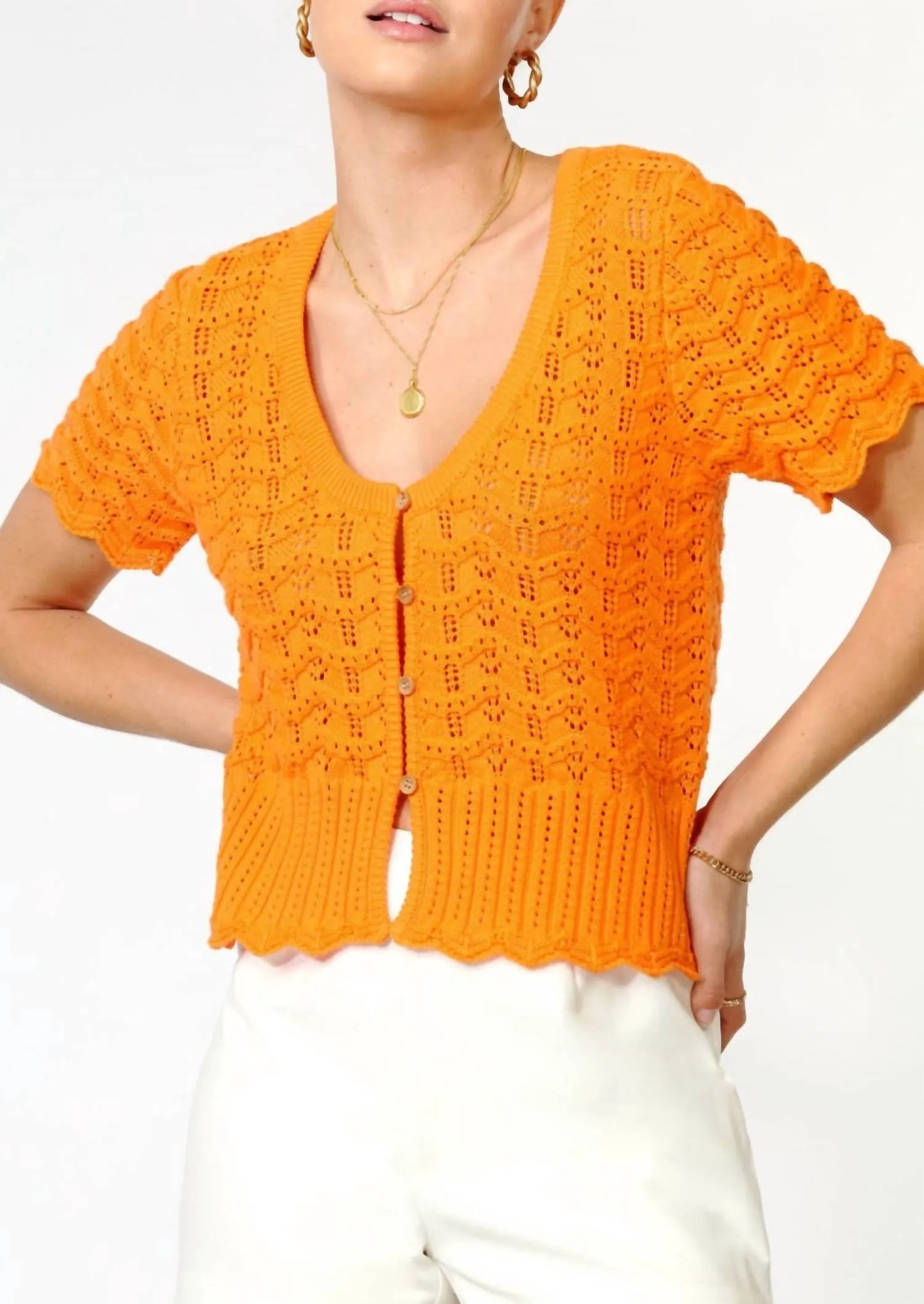 Cardigan Shanti à encolure échancrée et motifs festonnés en orange