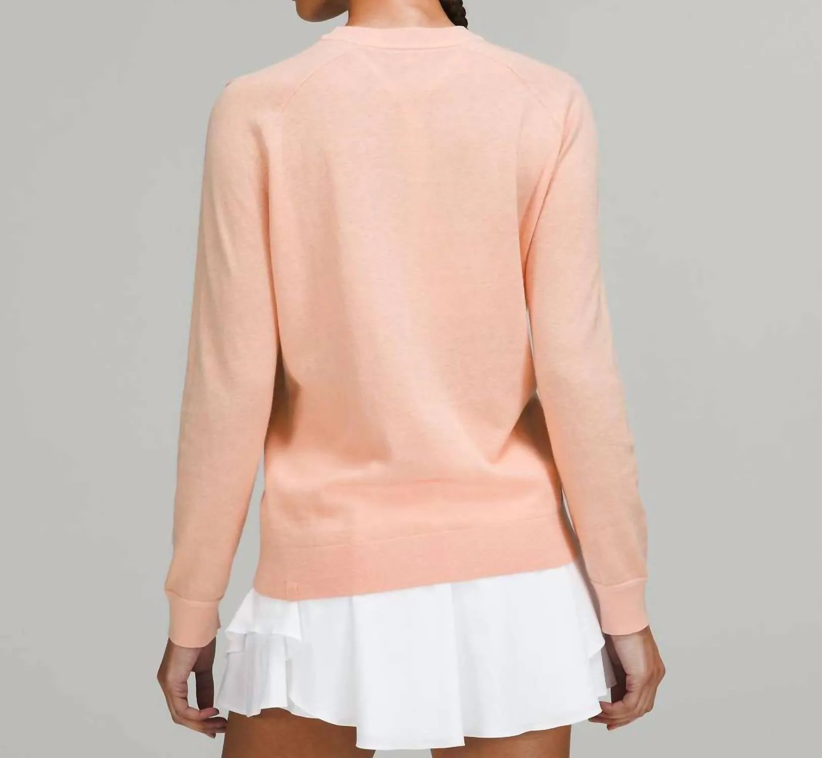 Pullover en mélange de soie en satin pêche