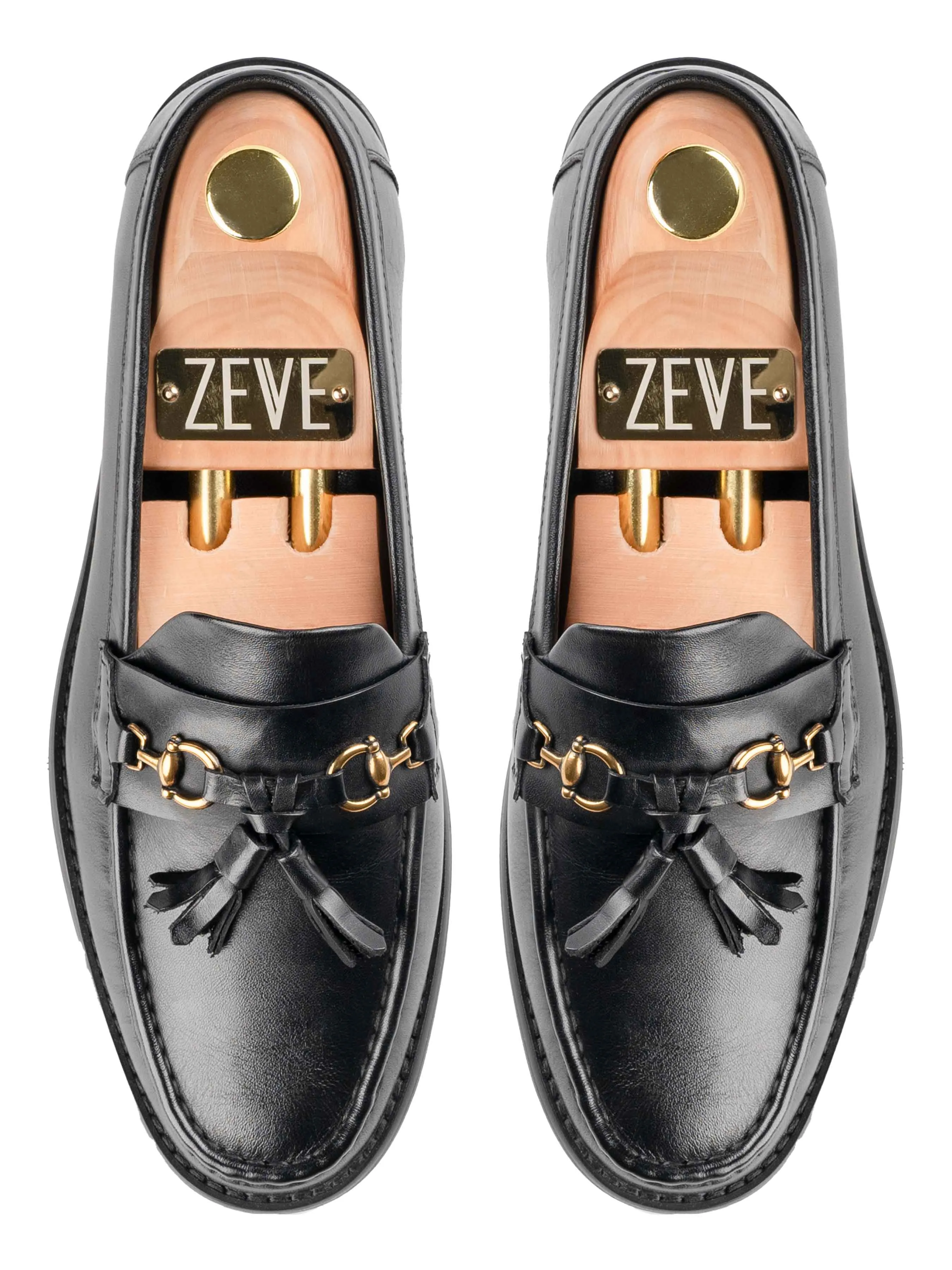 FirmGroundFeature Tassel Moccasin Buckle Loafer  - Solid Black Leather