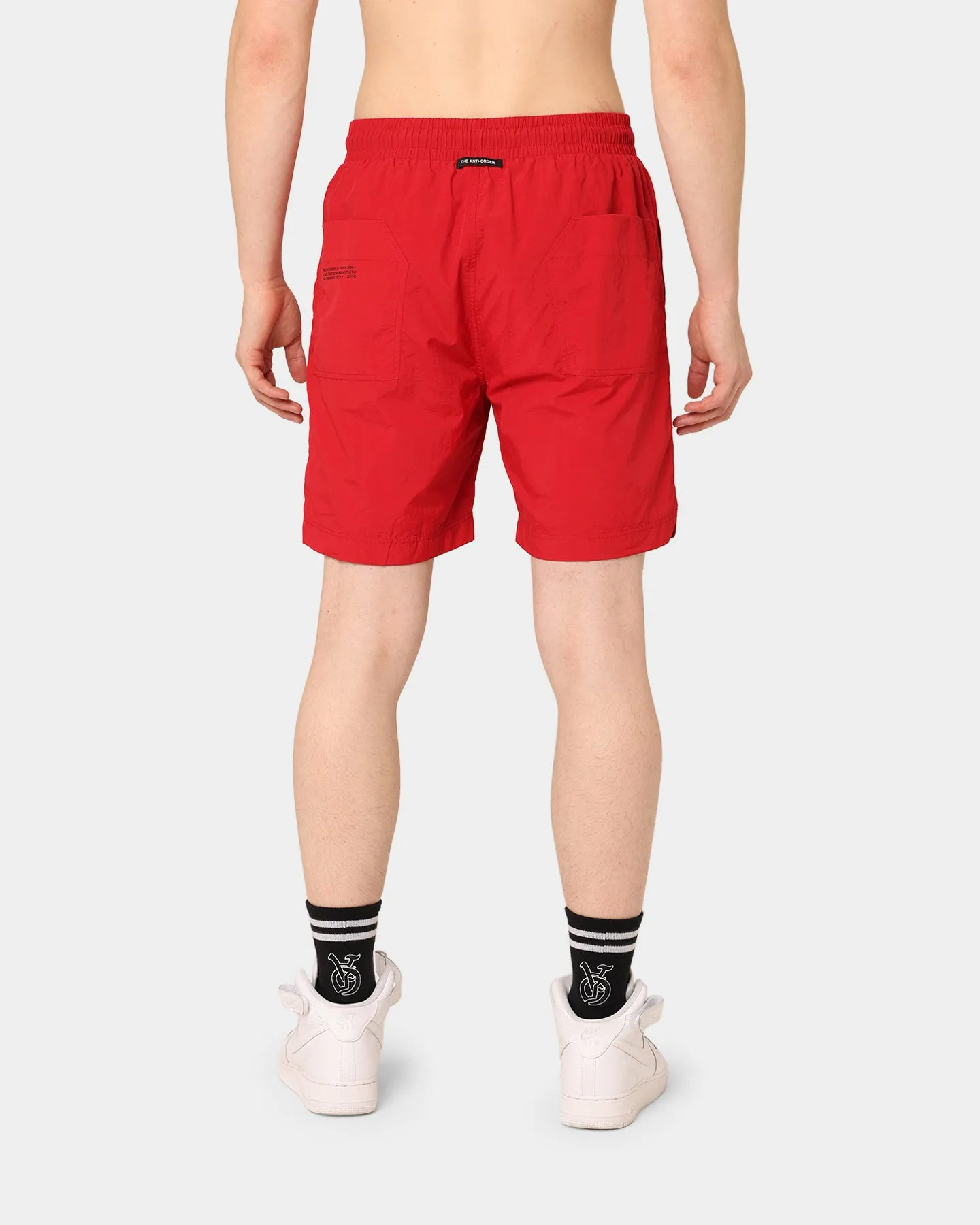 Le Short de Plage Antidote Anti-Ordre Rouge