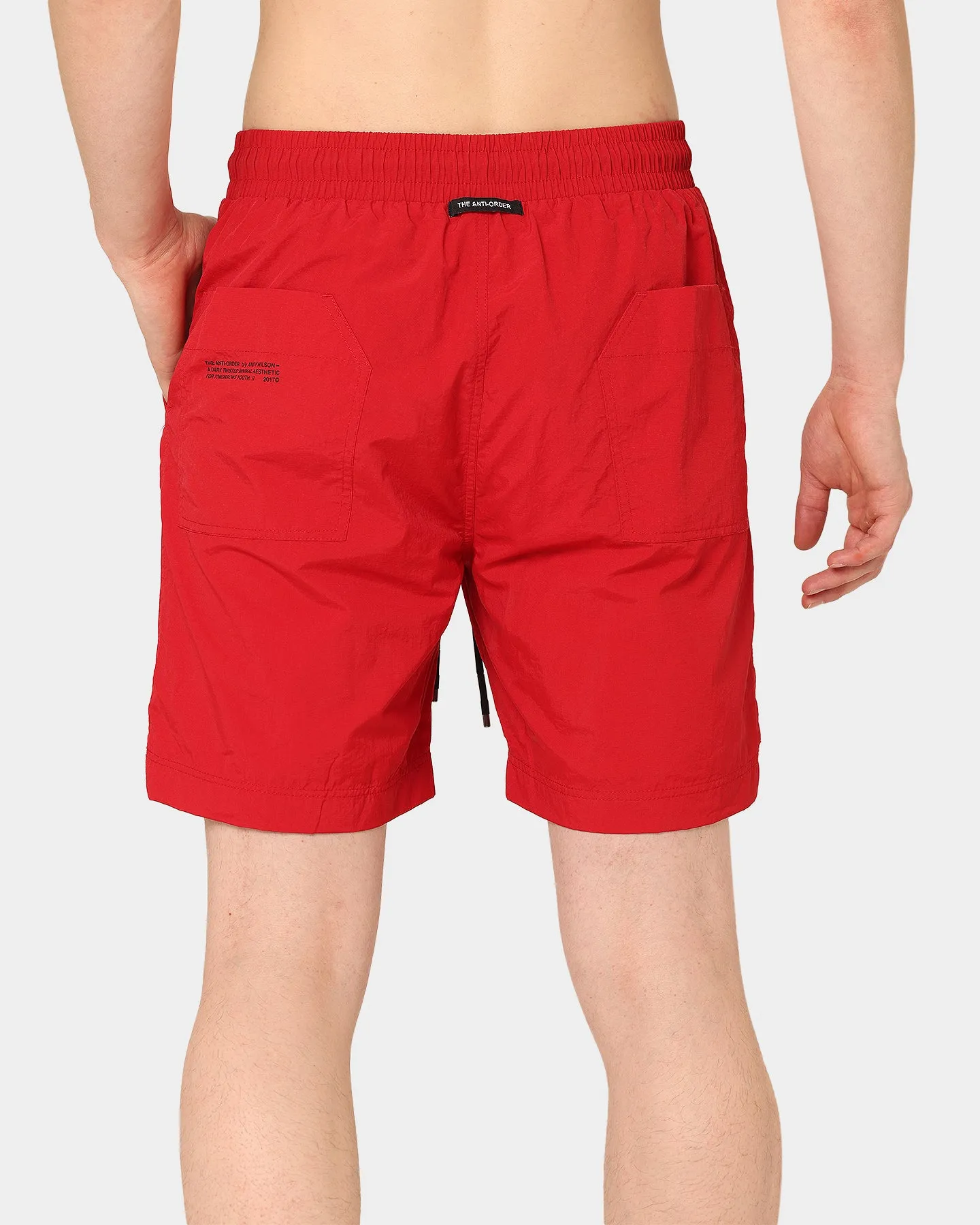 Le Short de Plage Antidote Anti-Ordre Rouge