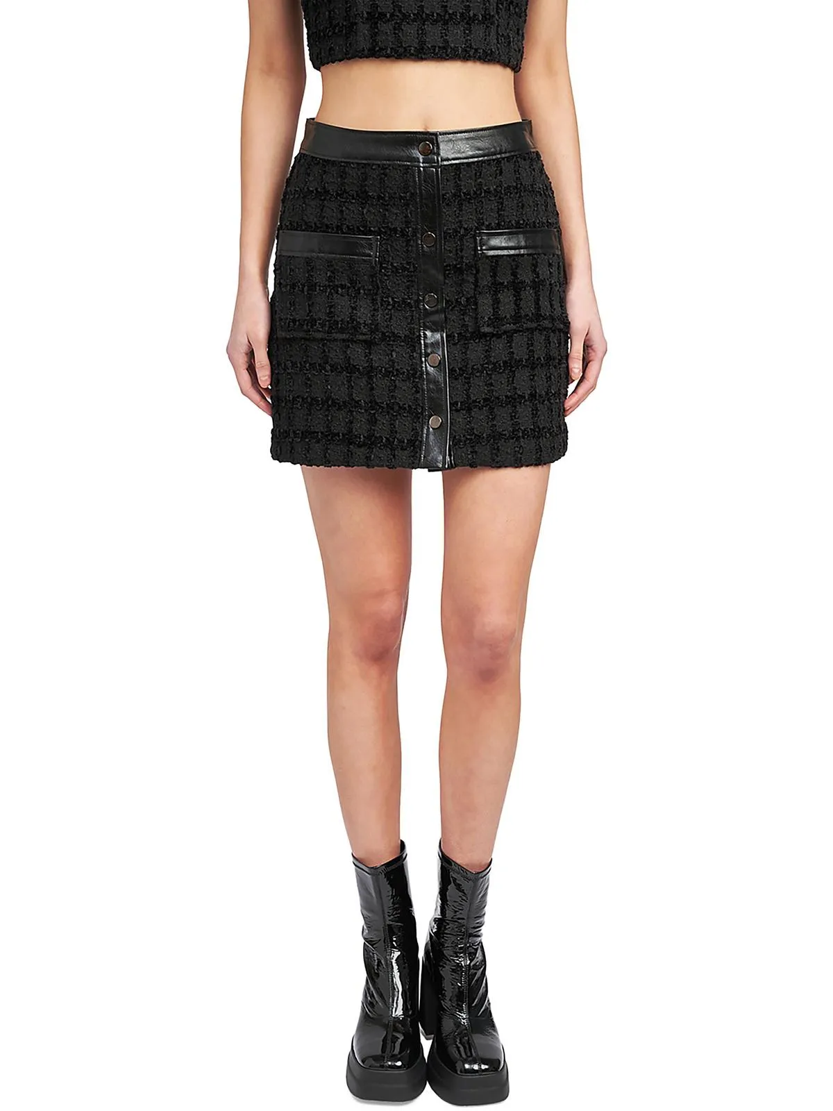 Mini-jupe en tweed pour femme avec garniture en similicuir